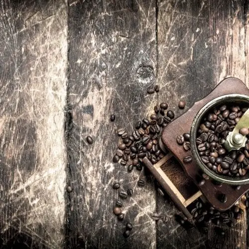 coffee grinder on old wood
