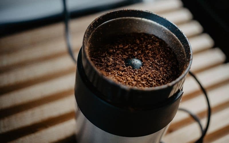 electric coffee grinder with grounds inside